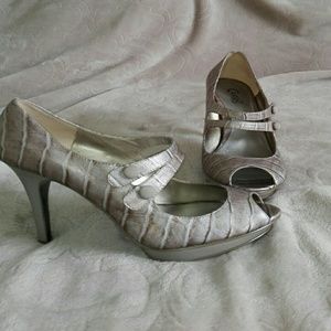 Carlos Santana leather heels.